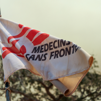 MSF flag blowing in the wind at Aweil project base.