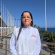 MSF psychologist Natalia Tapiero outside the temporary morgue at "Los Silos" port in La Guaira, Venezuela. 

"It is a very contradictory place: on one side, the vast blue sea; on the other, tents housing the most painful images imaginable," says Natalia, who has spent weeks providing psychological first aid to families searching for missing loved ones and supporting overwhelmed frontline workers following the earthquakes.